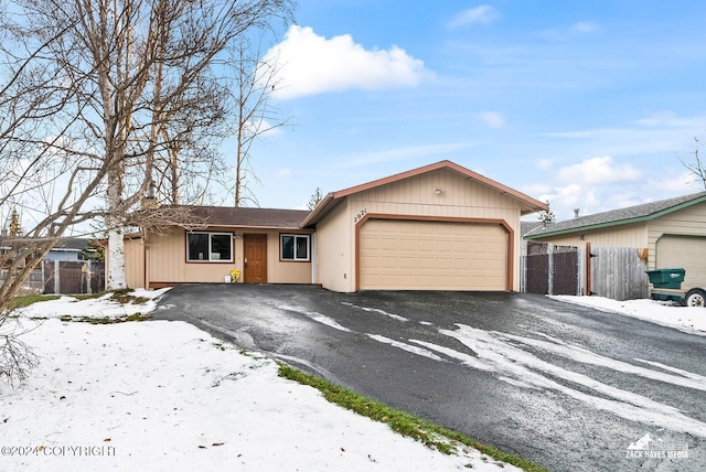 single story home with a garage