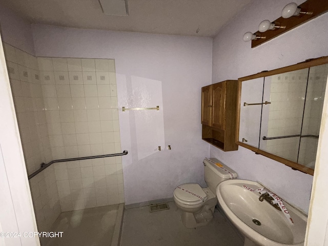 9231 Campbell Ter, Anchorage, AK 99515 - bathroom featuring a sink and a tile shower