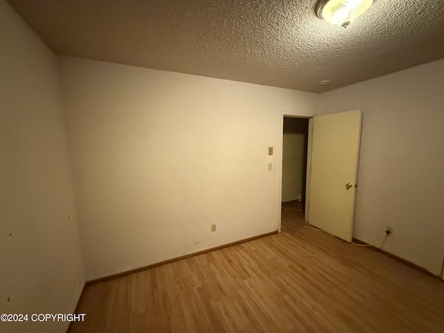 9231 Campbell Ter, Anchorage, AK 99515 - spare room featuring light wood finished floors