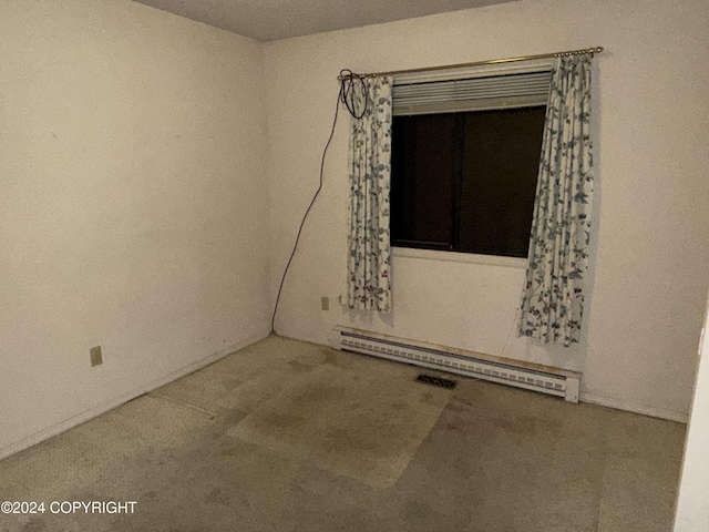 9231 Campbell Ter, Anchorage, AK 99515 - carpeted spare room with baseboard heating