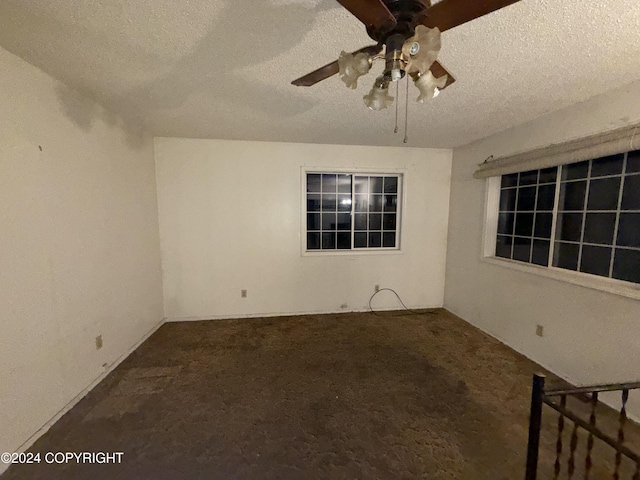 9231 Campbell Ter, Anchorage, AK 99515 - spare room with a textured ceiling, a ceiling fan, and carpet floors