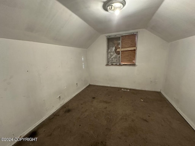 bonus room featuring vaulted ceiling