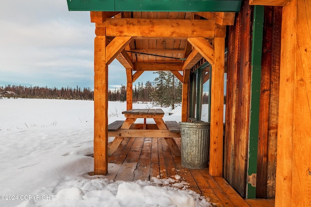 view of snow covered deck