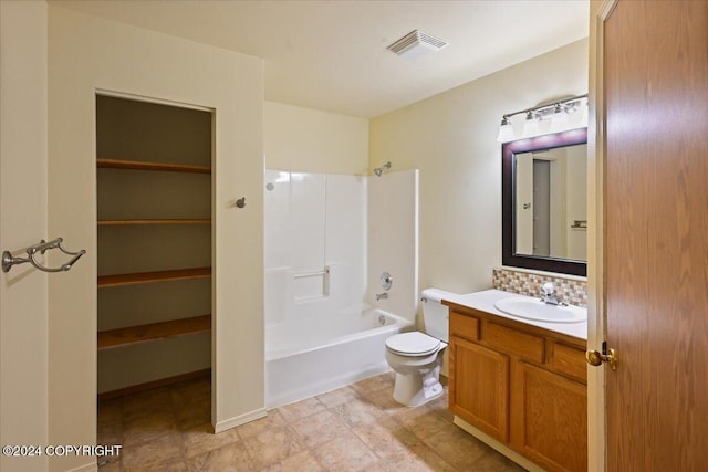 full bathroom featuring vanity, shower / bathtub combination, and toilet