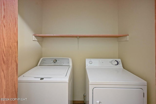 laundry room with washer and dryer