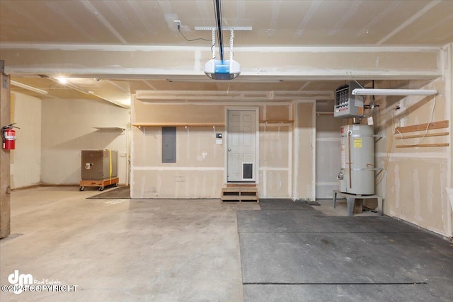 garage with a garage door opener, electric panel, and water heater