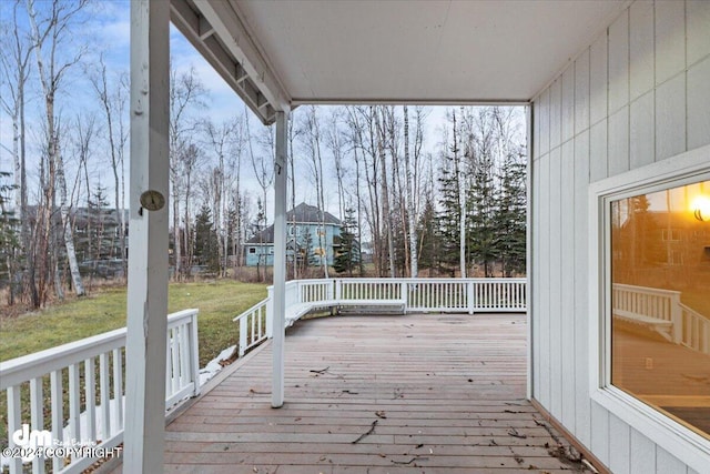 deck featuring a yard