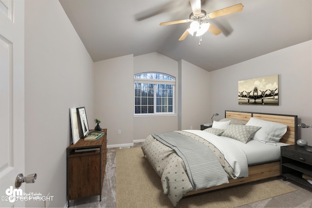 bedroom featuring vaulted ceiling, carpet, and ceiling fan