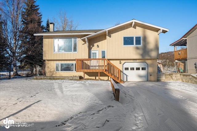 raised ranch featuring a garage