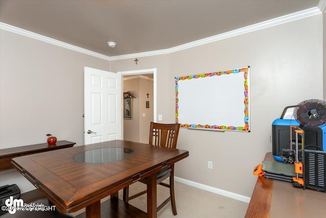 dining area featuring ornamental molding and light carpet