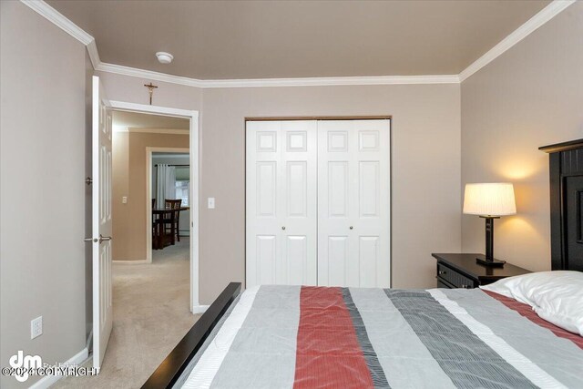 unfurnished bedroom with crown molding, light colored carpet, and a closet