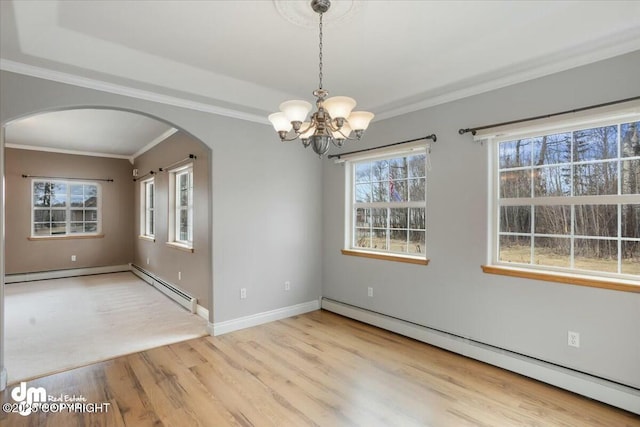 unfurnished dining area with a chandelier, baseboard heating, arched walkways, ornamental molding, and wood finished floors