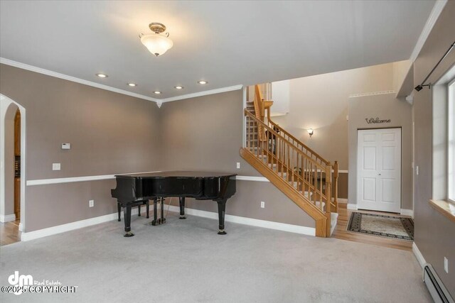 interior space with stairway, arched walkways, carpet, and a baseboard radiator