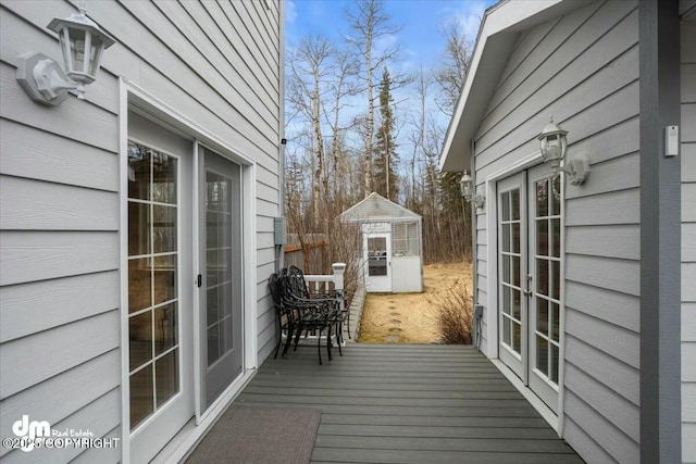 wooden deck with french doors