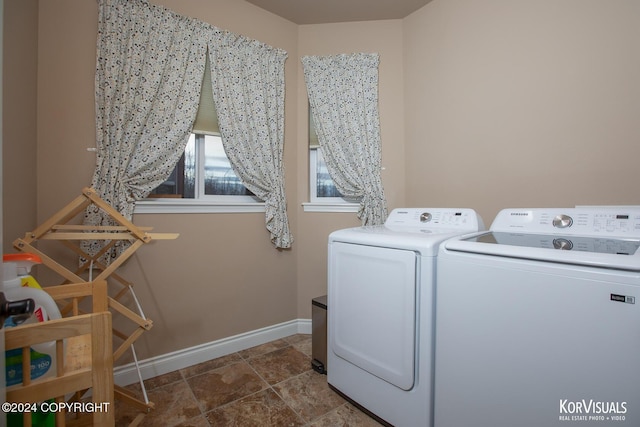 laundry area with independent washer and dryer