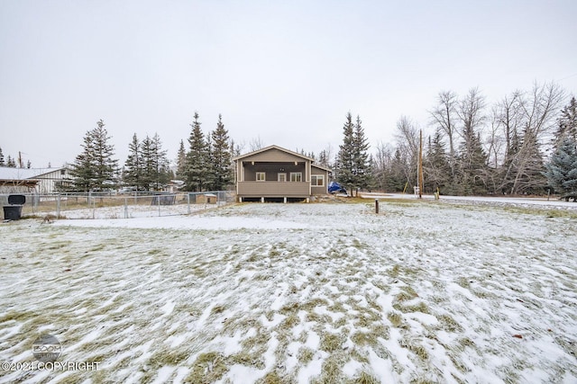 view of snow covered house