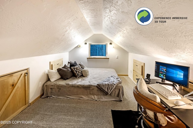 carpeted bedroom with a textured ceiling and lofted ceiling