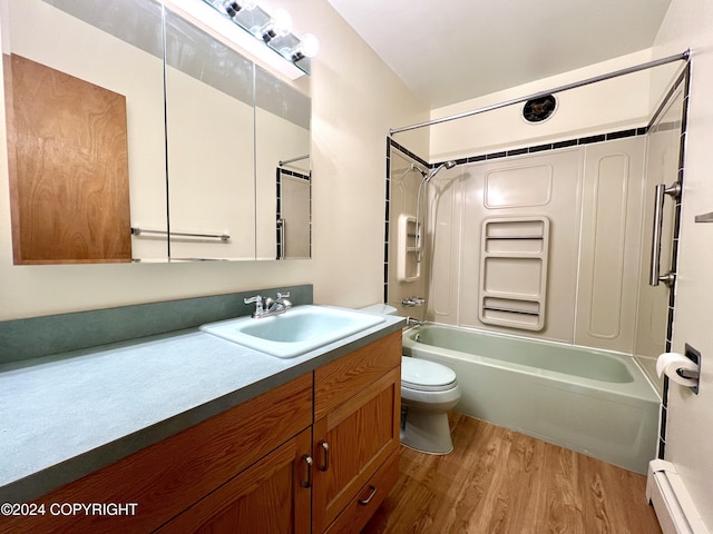 full bathroom featuring baseboard heating, wood-type flooring, vanity, toilet, and shower / bathtub combination