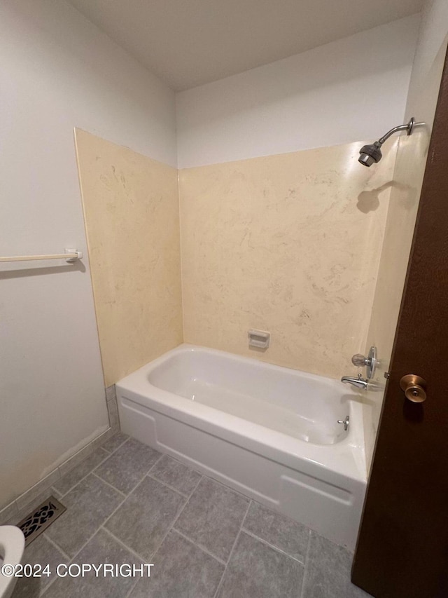 bathroom with  shower combination, tile patterned flooring, and visible vents