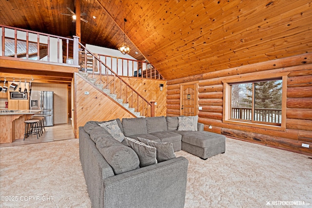 living room featuring ceiling fan, carpet floors, log walls, high vaulted ceiling, and wooden ceiling