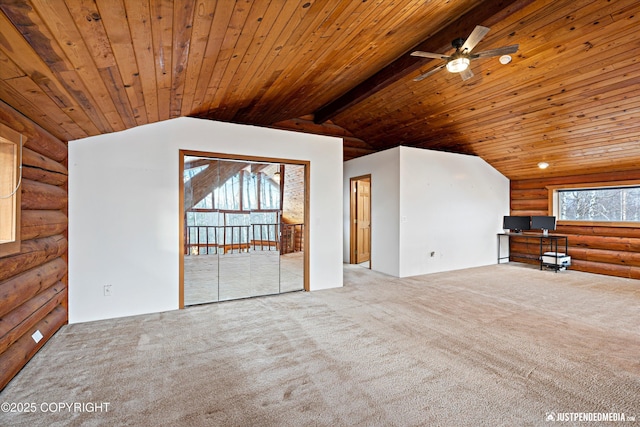 unfurnished living room featuring carpet floors, lofted ceiling with beams, wood ceiling, and rustic walls