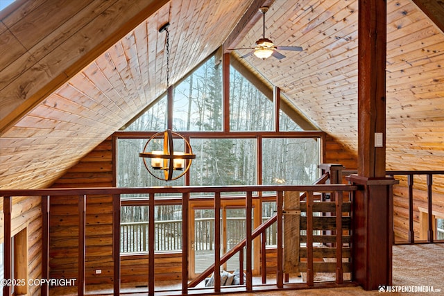 room details with wooden ceiling, carpet, beam ceiling, and ceiling fan with notable chandelier