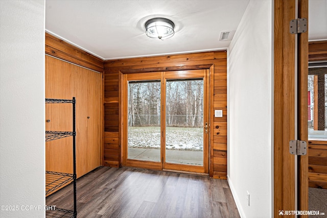 doorway featuring dark hardwood / wood-style flooring