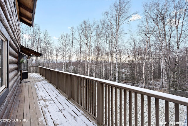 view of snow covered deck