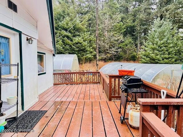 3411 Monashka Bay Rd, Kodiak, AK 99615 - wooden terrace with an exterior structure