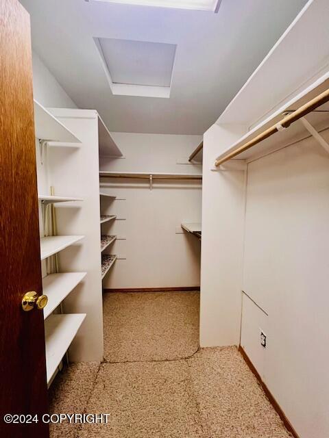 3411 Monashka Bay Rd, Kodiak, AK 99615 - spacious closet featuring attic access and carpet