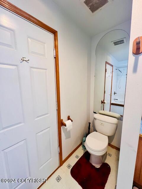 3411 Monashka Bay Rd, Kodiak, AK 99615 - full bath with toilet and baseboards