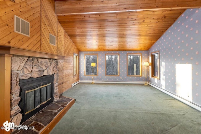 unfurnished living room featuring a fireplace, carpet floors, baseboard heating, and wood ceiling