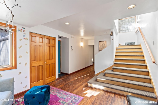 interior space with dark hardwood / wood-style floors