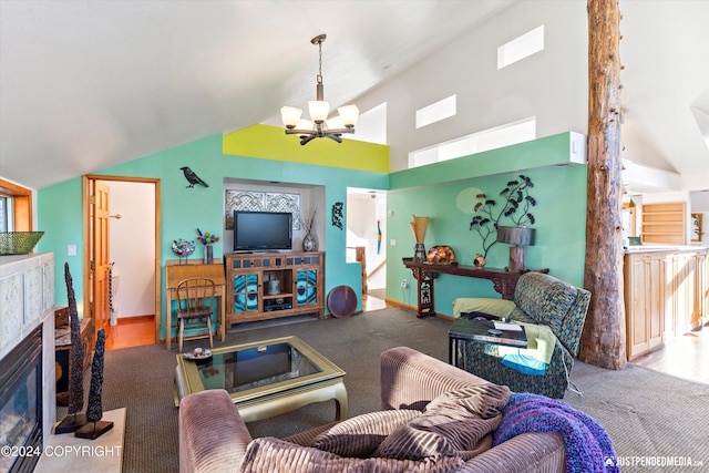 living room featuring carpet flooring, high vaulted ceiling, a tile fireplace, and an inviting chandelier