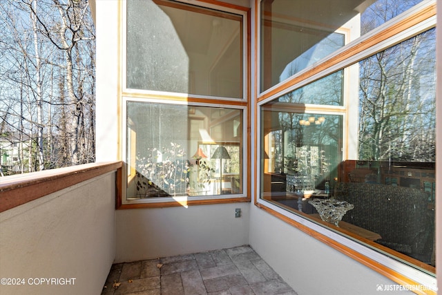 sunroom / solarium with a wealth of natural light