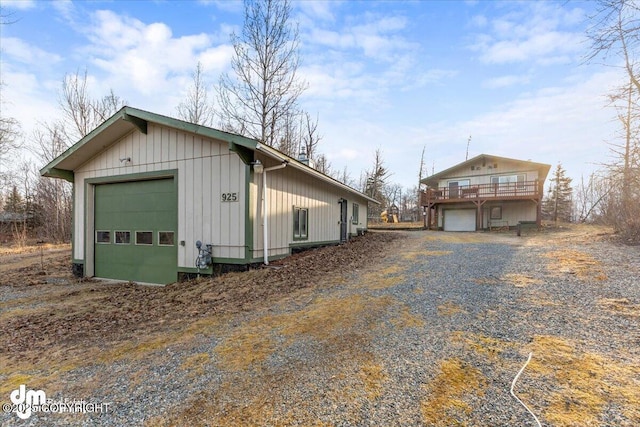 view of side of home with a garage