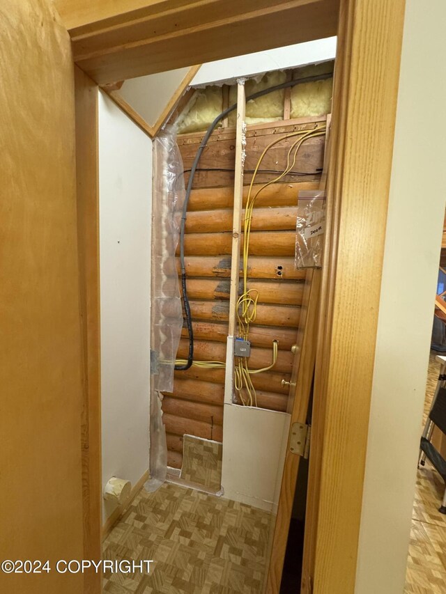 staircase with log walls