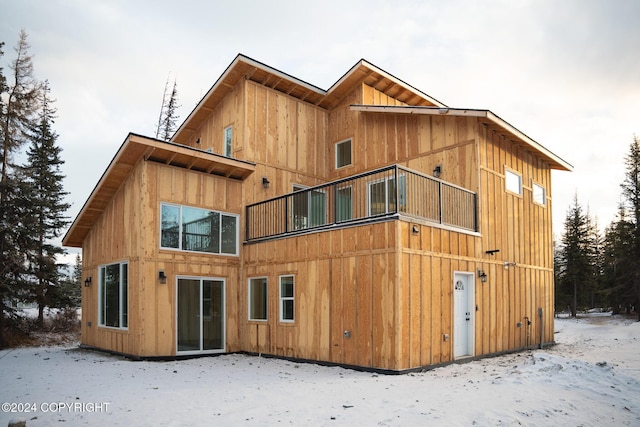 view of snow covered house