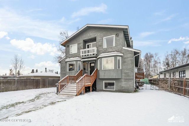 view of front of house with a balcony