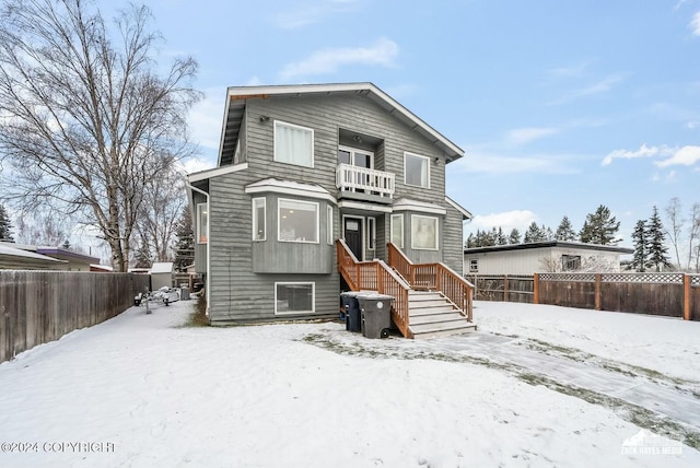 view of front of property with a balcony