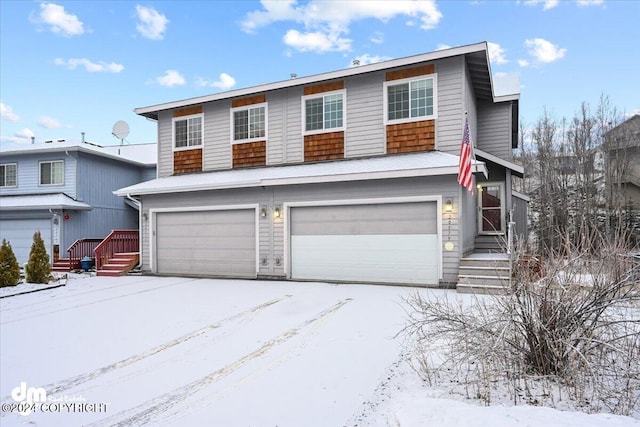 view of front of home with a garage