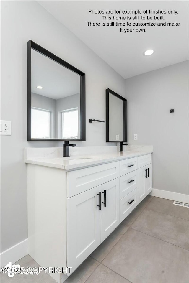 bathroom featuring vanity and tile patterned flooring