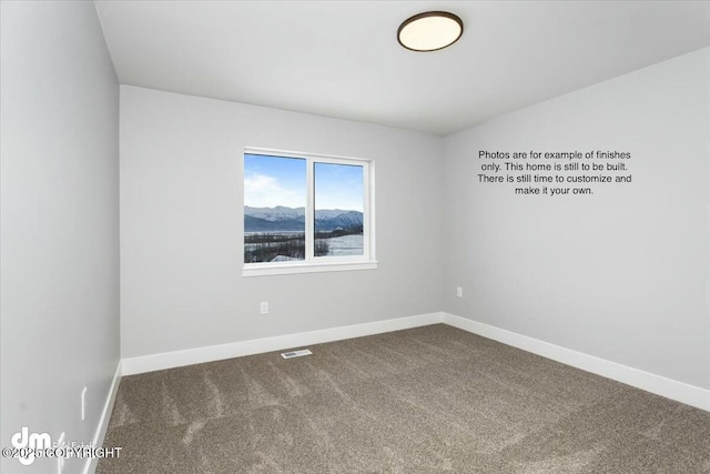 view of carpeted spare room