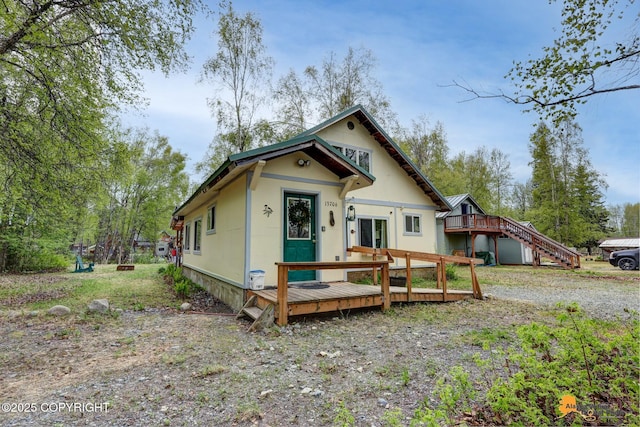 13718 E 1st St, Talkeetna, AK 99676 - view of front of property featuring a deck and stairs