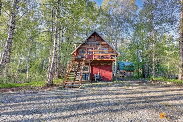 13718 E 1st St, Talkeetna, AK 99676 - rustic home featuring stairway