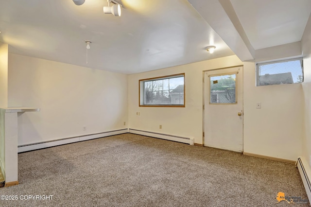 interior space featuring baseboards and a baseboard radiator