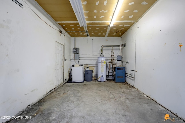 basement with gas water heater and a heating unit