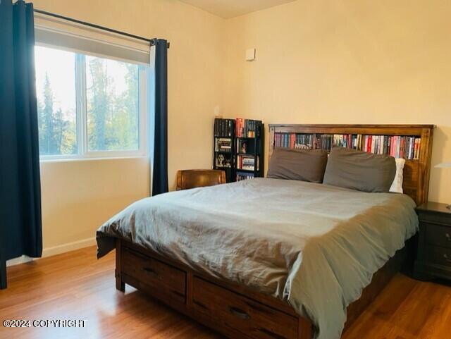 bedroom featuring light hardwood / wood-style flooring