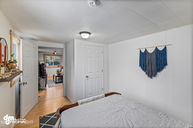 bedroom with light hardwood / wood-style floors