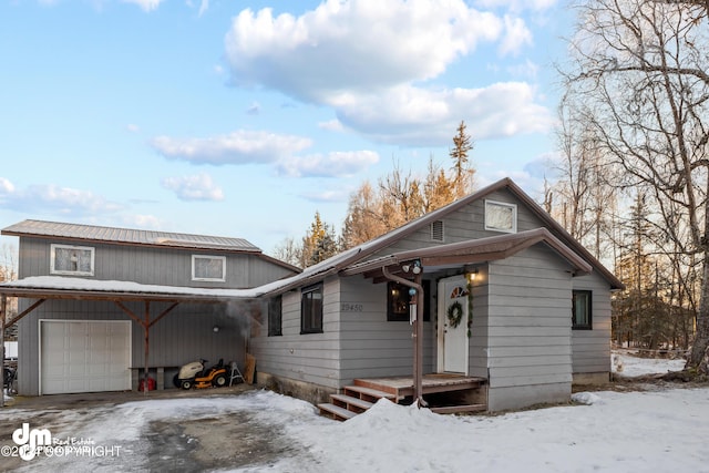 view of front of property with a garage